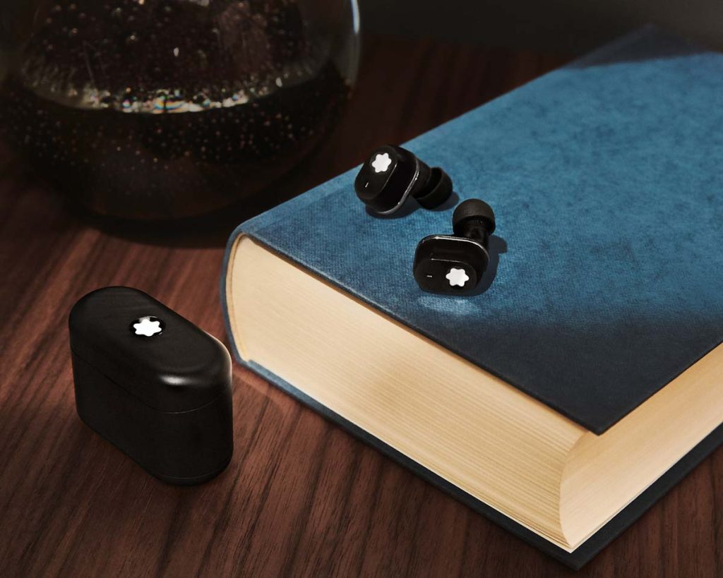 Discover Montblanc's first in-ear headphones inspired by their iconic writing instruments. Crafted sound, sleek design, and premium materials for luxury travellers.