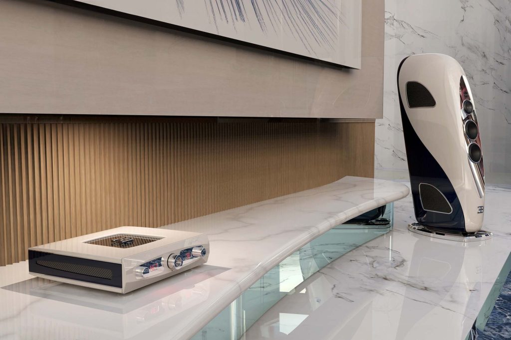 The TIDAL for Bugatti ‘Royale’ Loudspeaker stands in an opulent room, its design echoing the curves and finesse of Bugatti's aesthetic, promising an unparalleled auditory experience for the connoisseur.