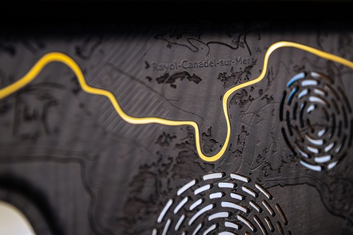 Rolls-Royce Phantom centenary woodwork panel with gold leafing, botanical motifs, and precision laser-cut speaker grille.